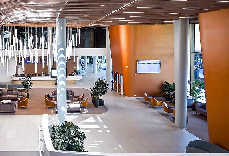 Hospital atrium with sofas and armchairs