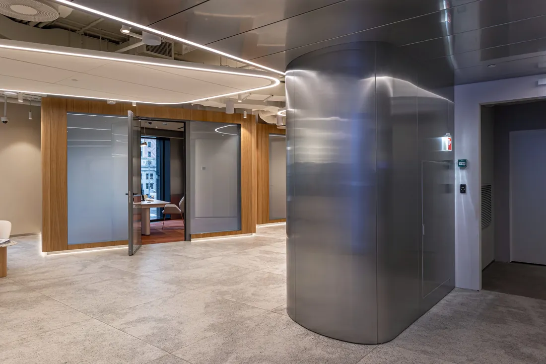 Radius stainless steel cladding around a lift core